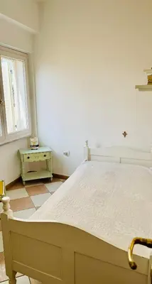 Letto o letti in una camera di Giomà central apartment