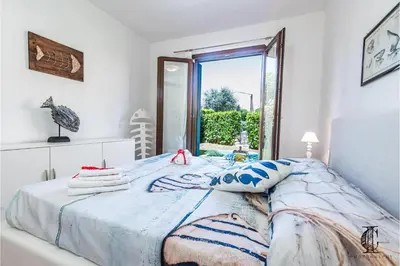 Letto o letti in una camera di Il Borgo 20 D4 700m From The Beach - Happy Rentals
