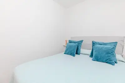 Letto o letti in una camera di Strepitoso Bilocale Via Mosca Olbia
