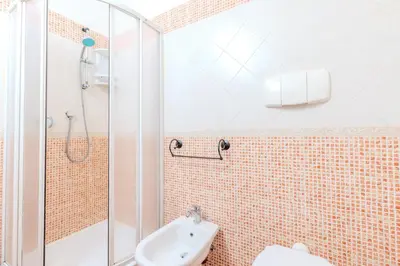 Bagno di Strepitoso Bilocale Via Mosca Olbia