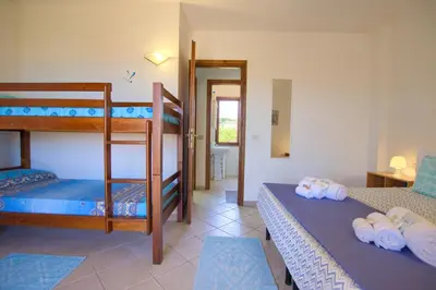 Letto o letti in una camera di 5 minutes to the sea - Villetta Mediterranea