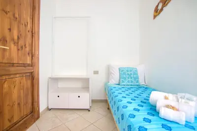 Letto o letti in una camera di 5 minutes to the sea - Villetta Mediterranea