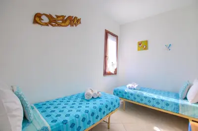 Letto o letti in una camera di 5 minutes to the sea - Villetta Mediterranea