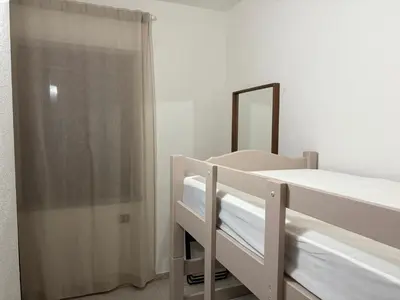 Letto o letti in una camera di Alga House