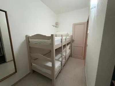 Letto o letti in una camera di Alga House