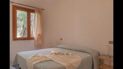 Letto o letti in una camera di Outstanding Residenze Gallura 2Bedrm sleep 6 plus possible additional Child bed