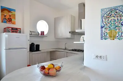 Cucina o angolo cottura di Villa syloic avec piscine filtrée hors sol pour enfants