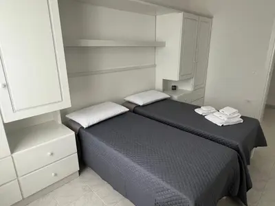 Letto o letti in una camera di Casa di Silvia