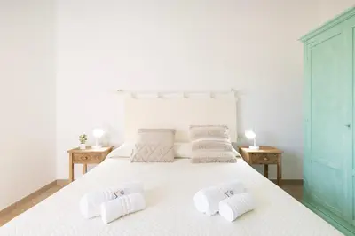 Letto o letti in una camera di Angolino di Sole