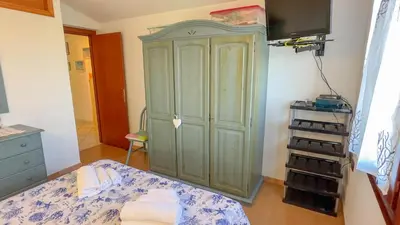 Letto o letti in una camera di Casa Tombolini