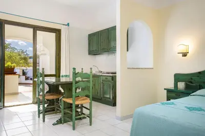 Letto o letti in una camera di Alba Dorata Resort