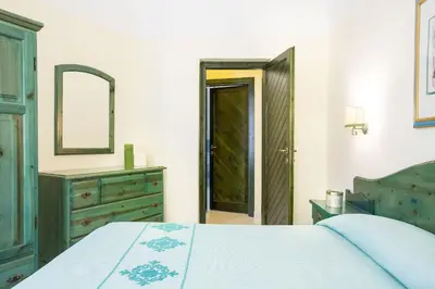 Letto o letti in una camera di Alba Dorata Resort