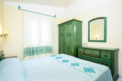 Letto o letti in una camera di Alba Dorata Resort