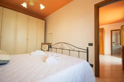 Letto o letti in una camera di La Caletta 3