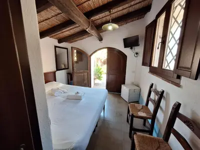Letto o letti in una camera di Malicas