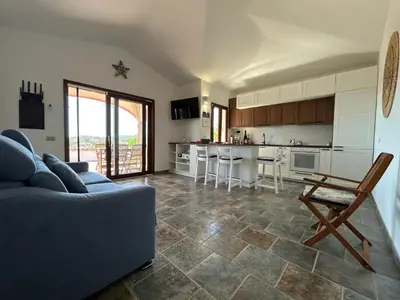 Cucina o angolo cottura di Villa con giardino e spettacolare vista mare a Porto San Paolo