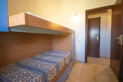 Letto o letti in una camera di Appartamenti Fronte Mare