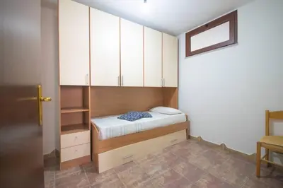 Letto o letti in una camera di Appartamenti Fronte Mare