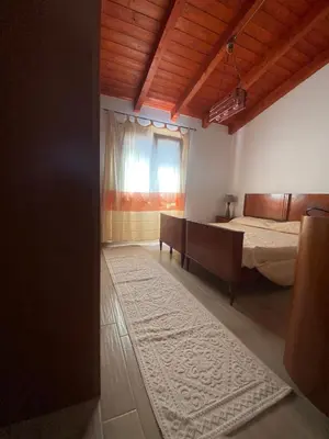 Letto o letti in una camera di Villa Rita Porto Ottiolu