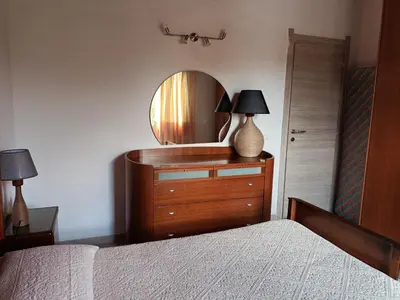 Letto o letti in una camera di Villa Rita Porto Ottiolu