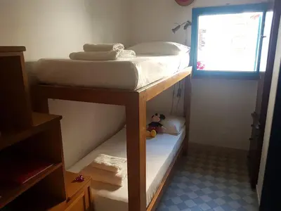 Letto o letti in una camera di Beachfront villa, right ON SAND!