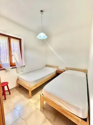 Letto o letti in una camera di Trentino 7