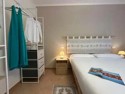 Letto o letti in una camera di NG Collection I Graniti