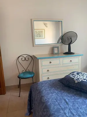 Letto o letti in una camera di Splendido appartamento San Teodoro centro