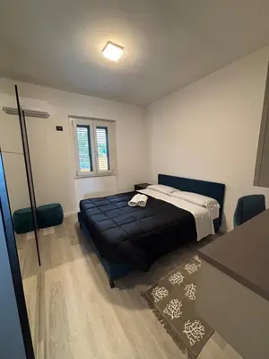 Letto o letti in una camera di Casa Limoncello