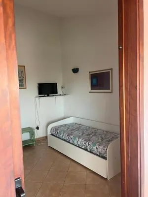 Letto o letti in una camera di Residence Uliveto