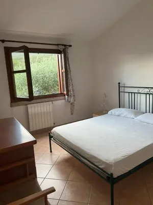 Letto o letti in una camera di Residence Uliveto