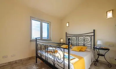 Letto o letti in una camera di Ampio Appartamento In Centro