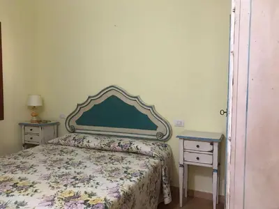 Letto o letti in una camera di Casa Pamela - Villa con piscina - San Teodoro