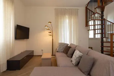 TV o dispositivi per l'intrattenimento presso Casa Marina con Patio by Wonderful Italy
