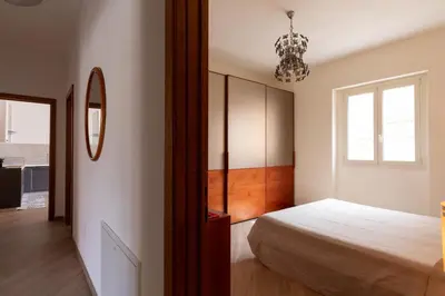 Letto o letti in una camera di Casa Marina con Patio by Wonderful Italy