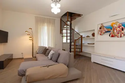 Area soggiorno di Casa Marina con Patio by Wonderful Italy