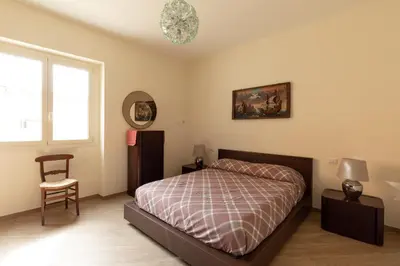 Letto o letti in una camera di Casa Marina con Patio by Wonderful Italy