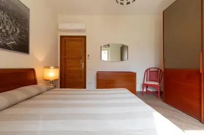 Letto o letti in una camera di Casa Marina con Patio by Wonderful Italy