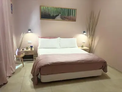 Letto o letti in una camera di Casa relax home