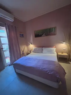 Letto o letti in una camera di Casa relax home