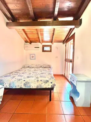 Letto o letti in una camera di Villino Il Canneto