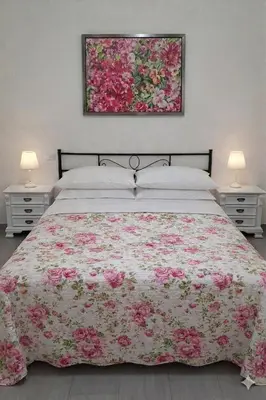 Letto o letti in una camera di Budoni -San Pietro