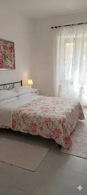 Letto o letti in una camera di Budoni -San Pietro