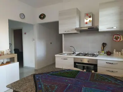 Cucina o angolo cottura di Marelìa holiday apartment in La Caletta