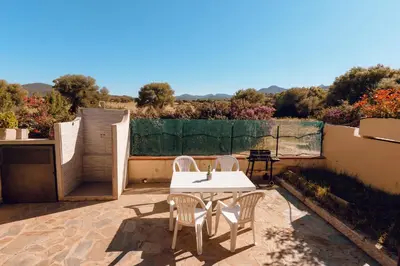 Balcone o terrazza di VILLETTA ESCLUSIVA CON GIARDINO, San Teodoro Paradiso Terrestre