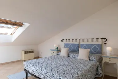 Letto o letti in una camera di Appartamento la Via del Mare by Wonderful Italy