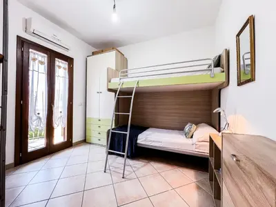 Letto o letti in una camera di Ginestra house