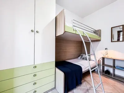 Letto o letti in una camera di Ginestra house