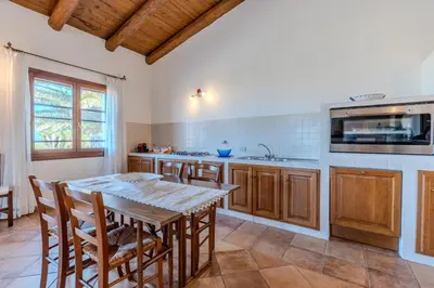 Cucina o angolo cottura di Splendido Stazzo vista mare San Teodoro Lu Fraili