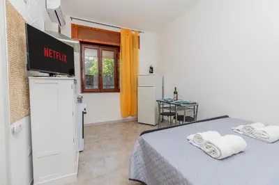 Letto o letti in una camera di Solskin Apartment - A due passi dal Lungomare -